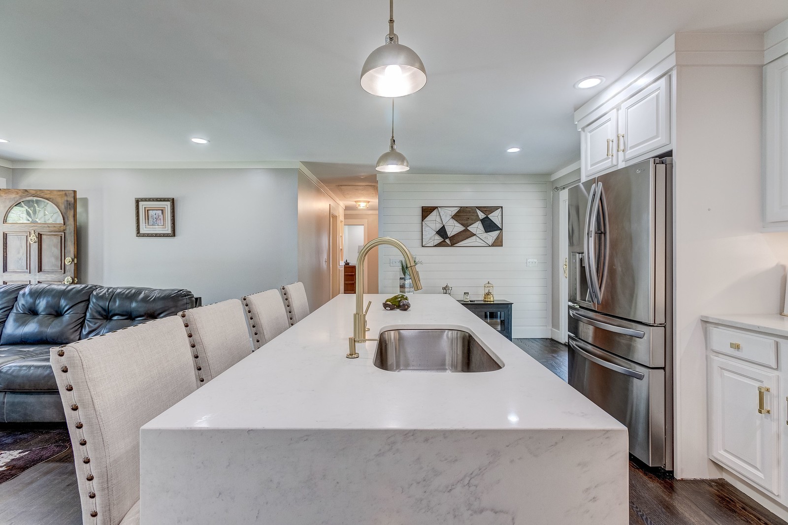 490 Rural Hill Road Nashville, TN 37217 - Photo 14 of 36 a kitchen with stainless steel appliances a refrigerator a sink a chandelier and living room view