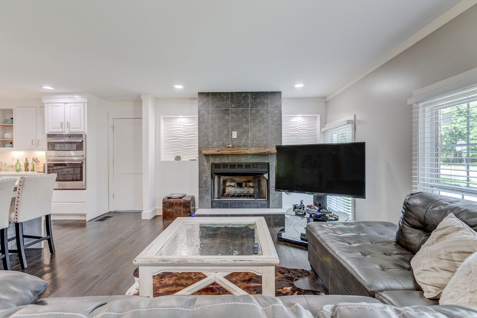 490 Rural Hill Road Nashville, TN 37217 - Photo 7 of 36 a living room with furniture and a flat screen tv