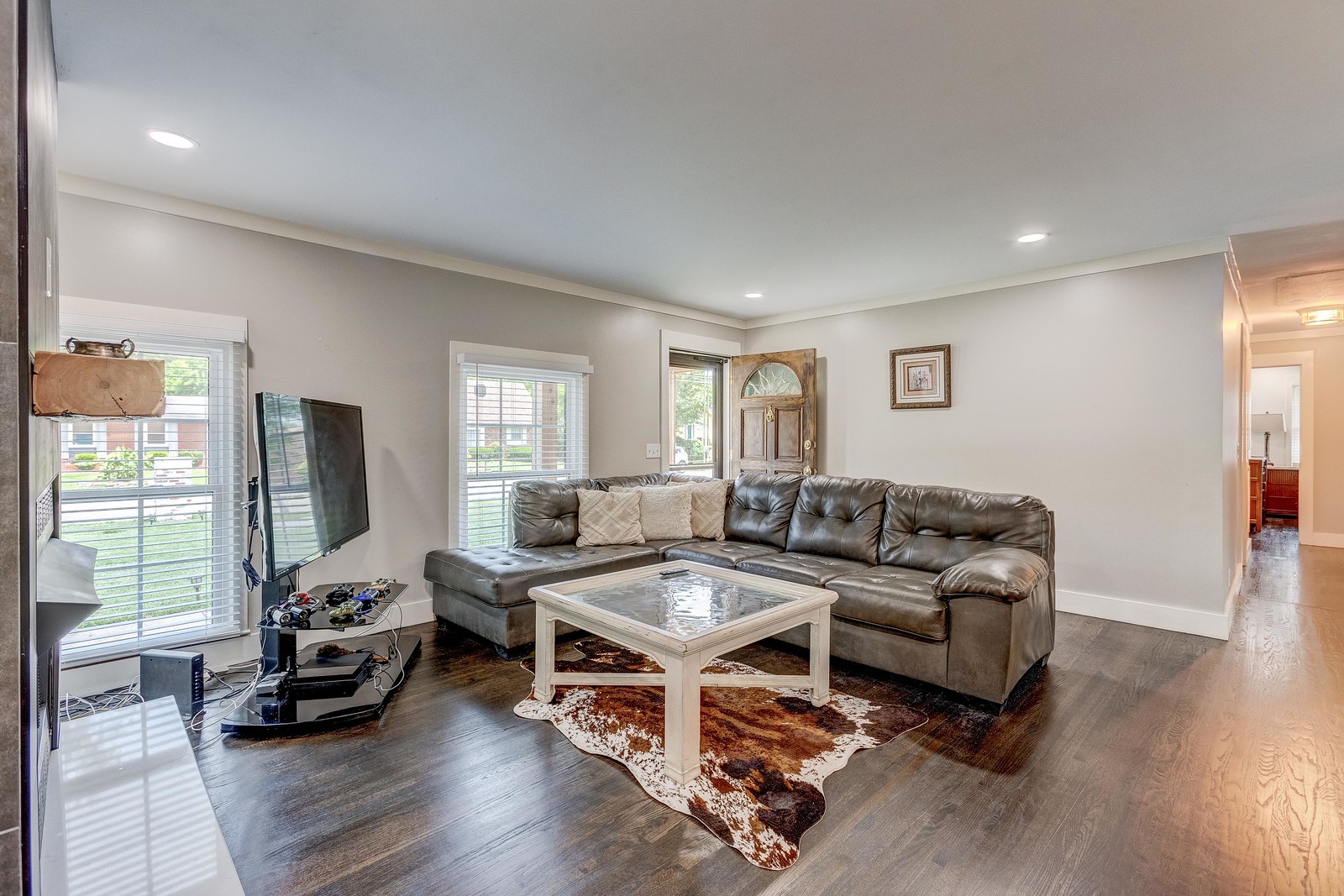 490 Rural Hill Road Nashville, TN 37217 - Photo 8 of 36 a living room with furniture and a flat screen tv