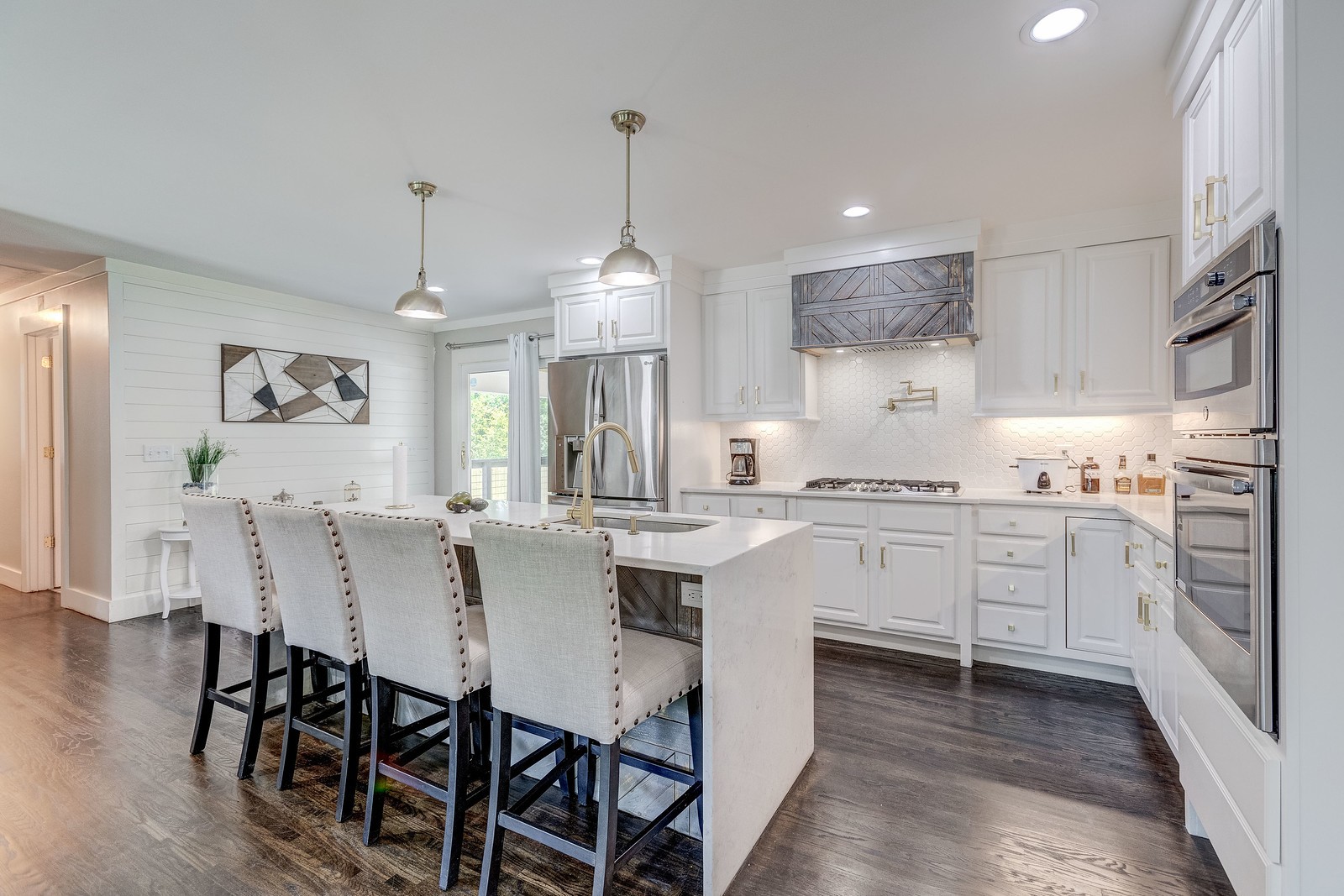 490 Rural Hill Road Nashville, TN 37217 - Photo 9 of 36 a kitchen with white cabinets and white appliances
