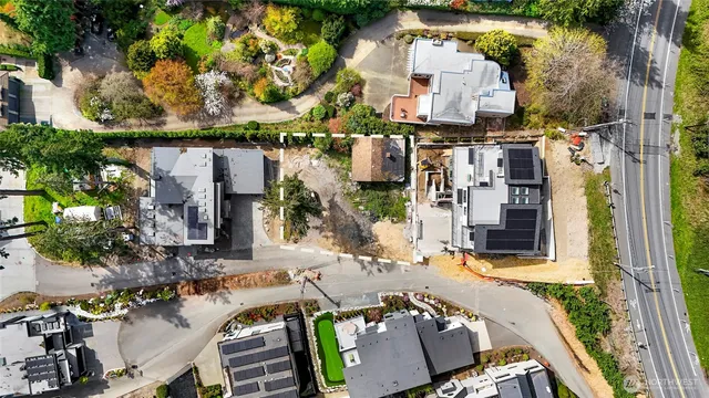 an aerial view of a house with outdoor space