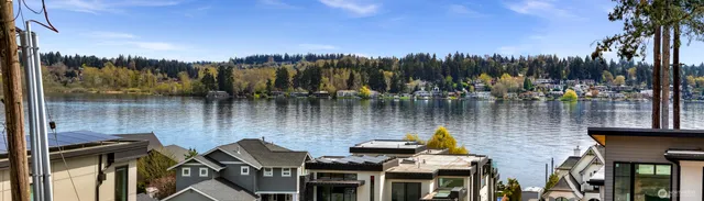 a view of a swimming pool with a lake view
