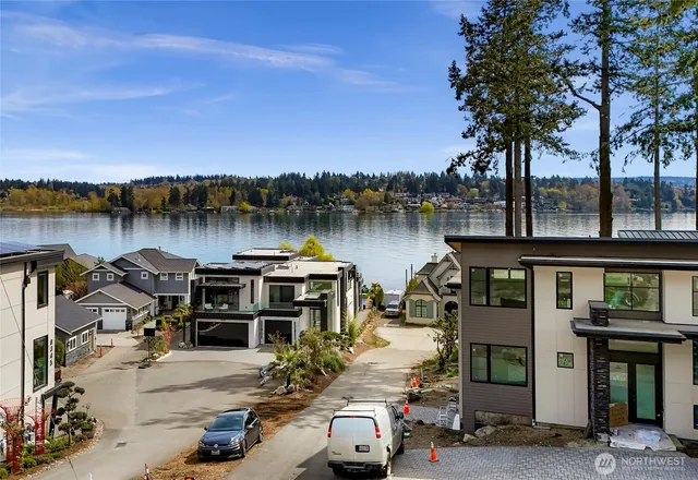 a view of a yard with swimming pool