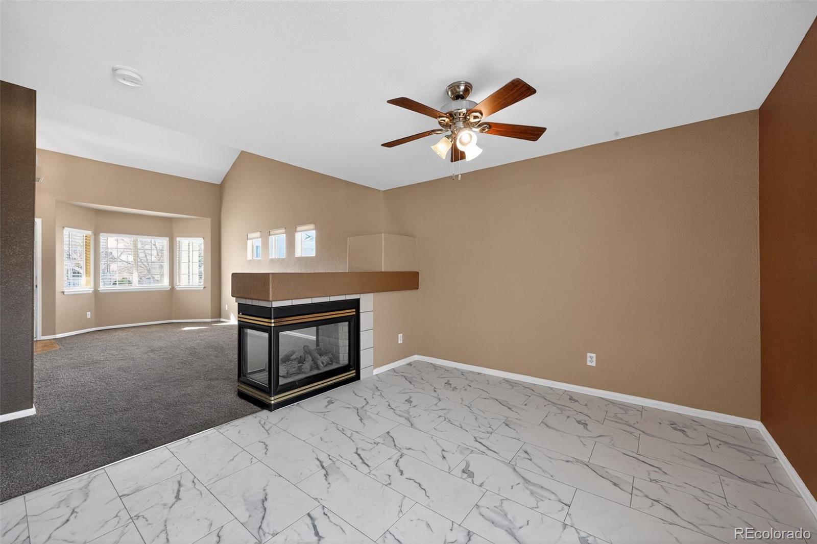6299 Taylor Street Frederick, CO 80530 - Photo 7 of 38 a bedroom with a bed and a window