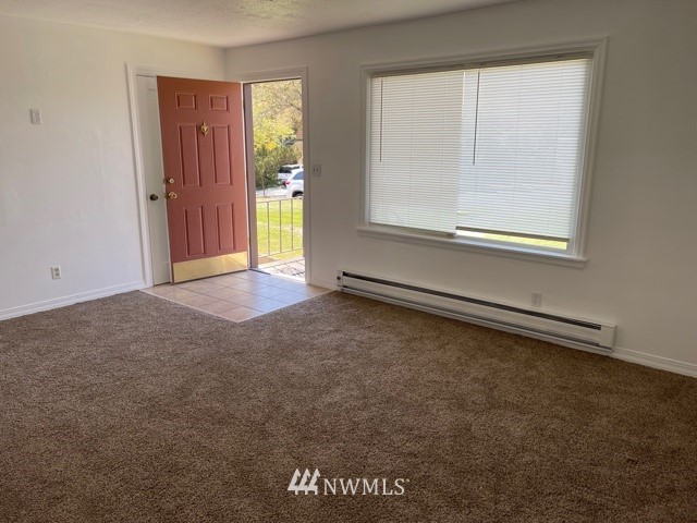 216 Statter Road Ephrata, WA 98823 - Photo 5 of 12 an empty room with windows