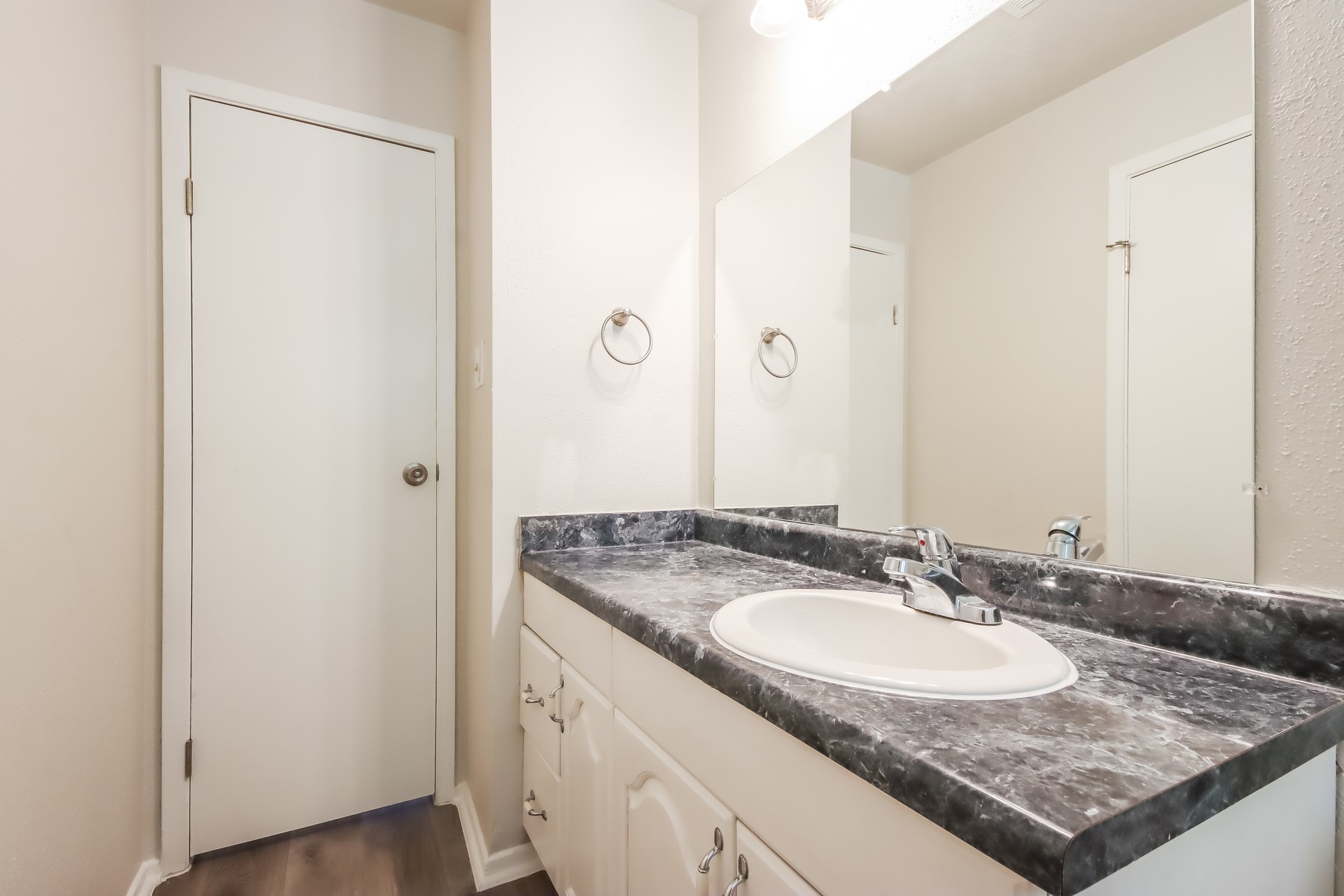 5312 Lynngate Drive Spring, TX 77373 - Photo 13 of 16 a bathroom with a granite countertop sink and a mirror
