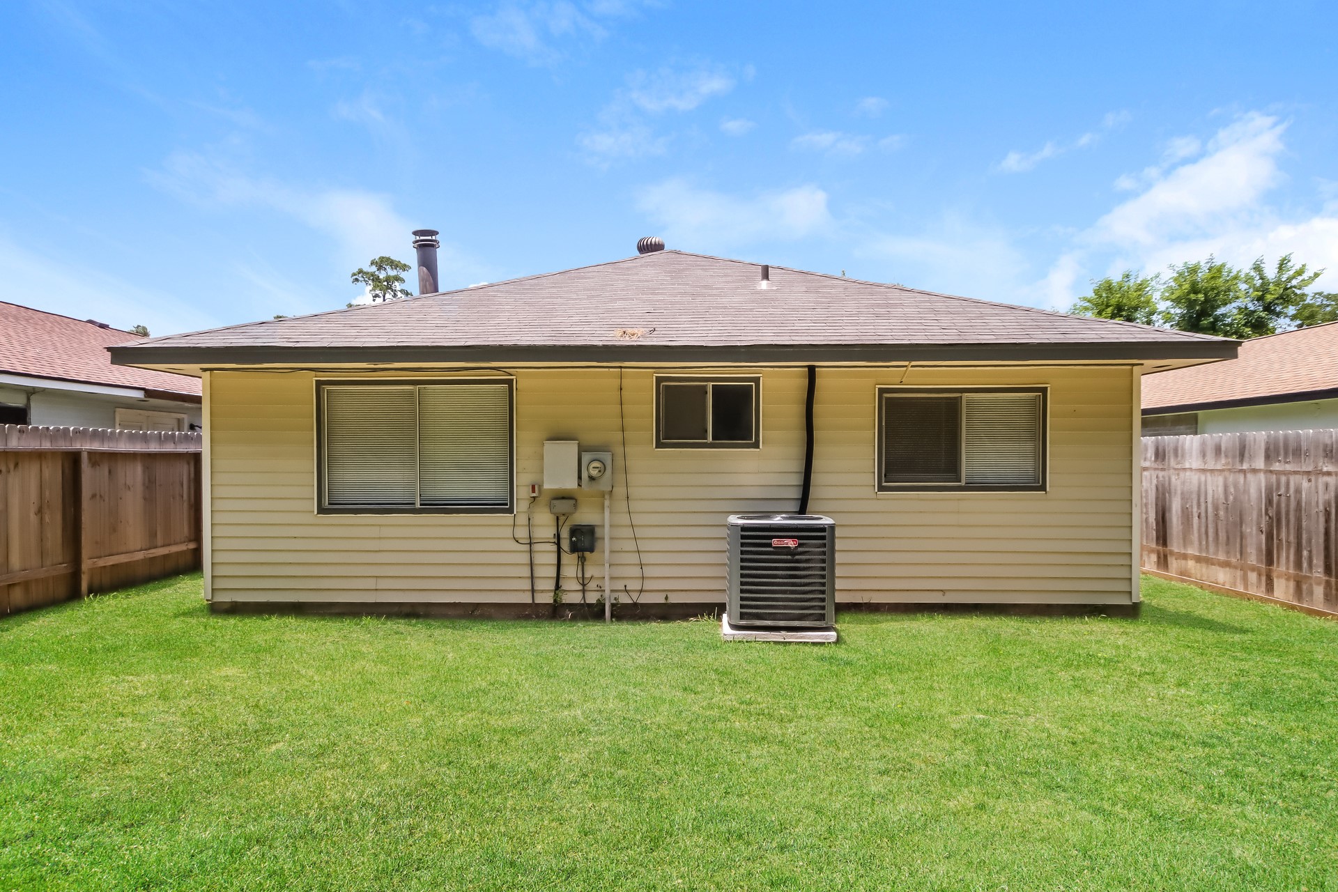 5312 Lynngate Drive Spring, TX 77373 - Photo 14 of 16 a front view of a house with a garden