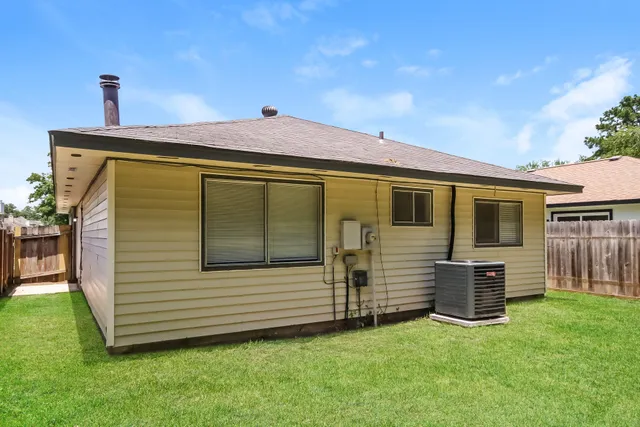 a view of a back yard of the house