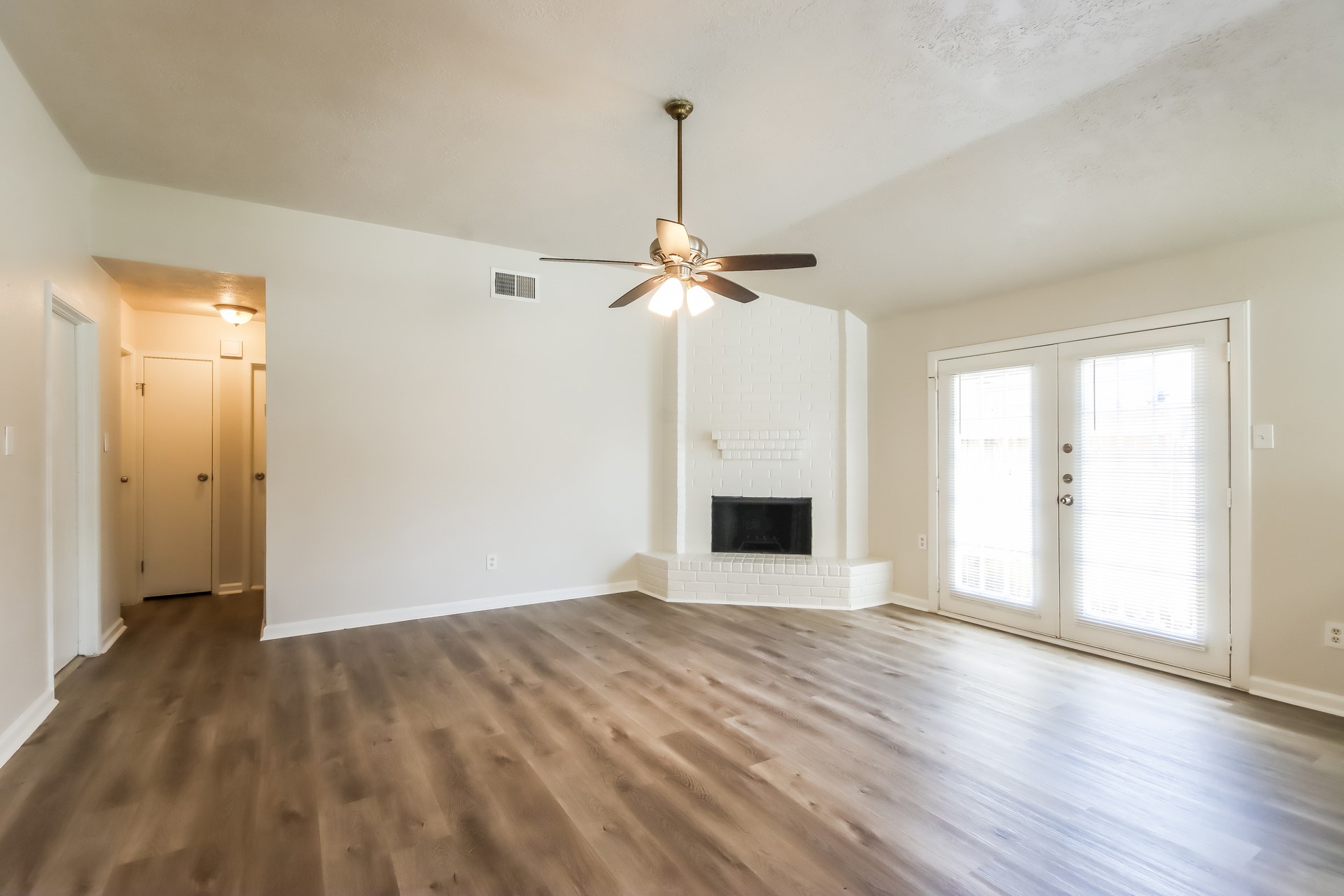 5312 Lynngate Drive Spring, TX 77373 - Photo 3 of 16 a view of a livingroom with wooden floor