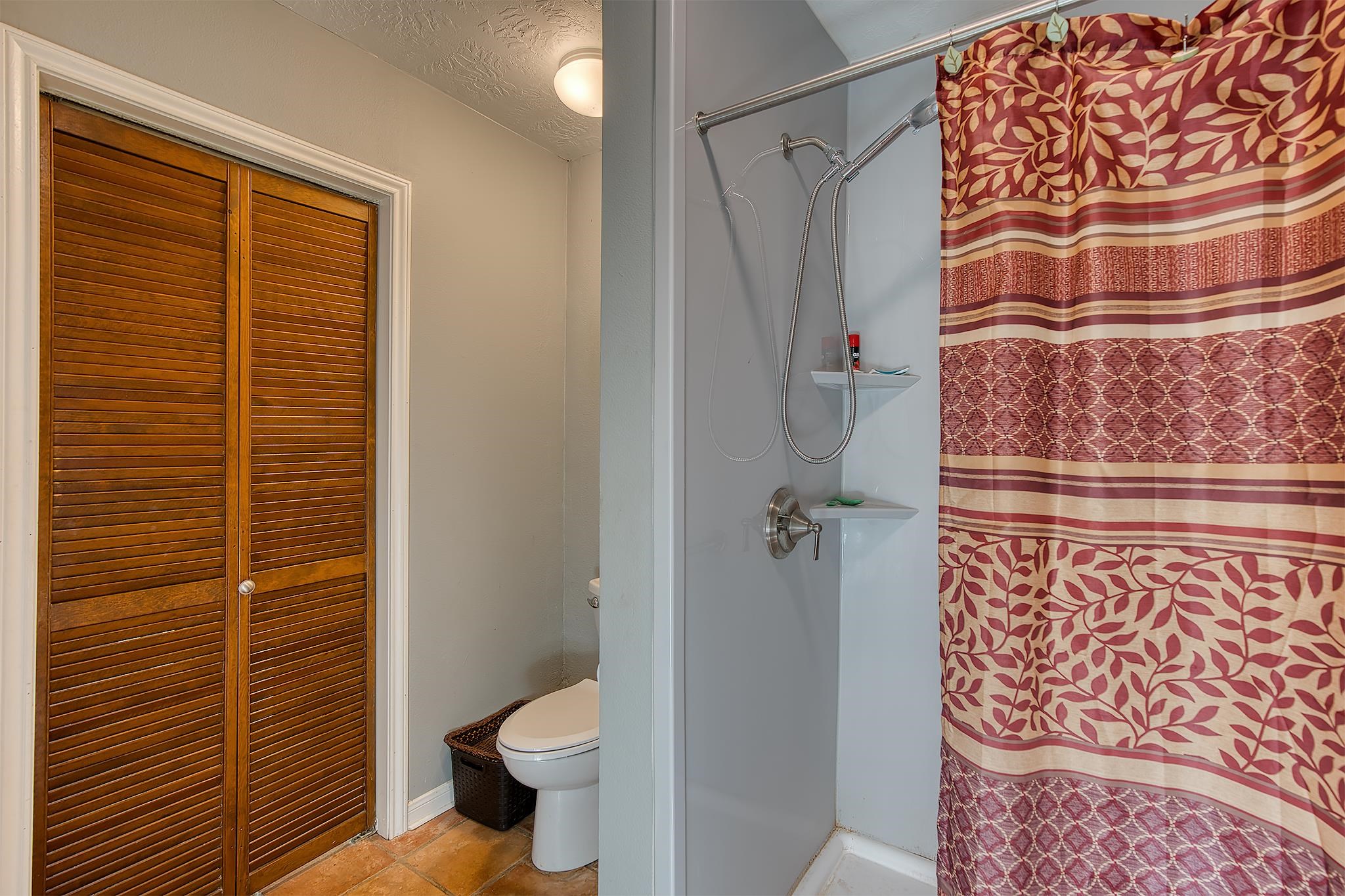 7476 Foard Road Beaumont, TX 77705 - Photo 37 of 49 a bathroom with a toilet and shower