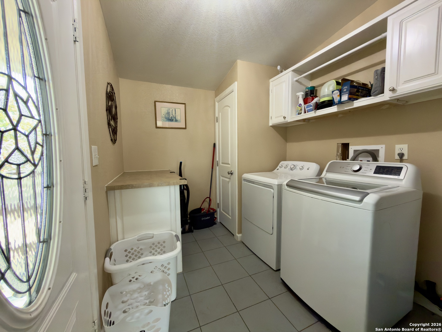 946 Frontier Lane Bandera, TX 78003 - Photo 27 of 48 a utility room with dryer and washer