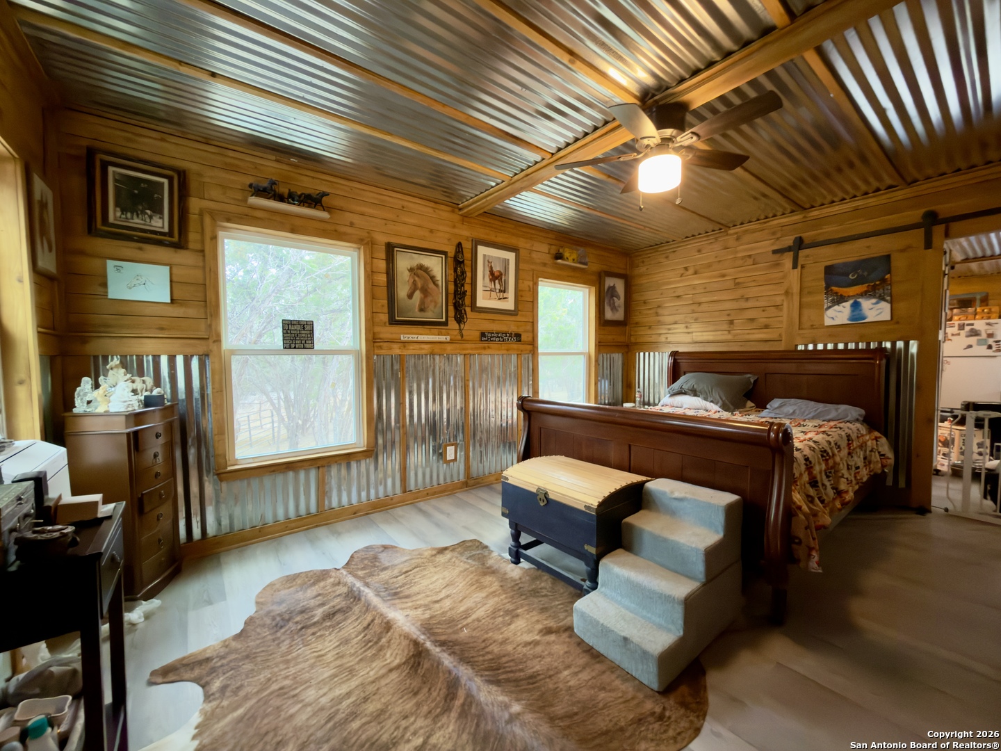 946 Frontier Lane Bandera, TX 78003 - Photo 36 of 48 a bedroom with furniture and a window