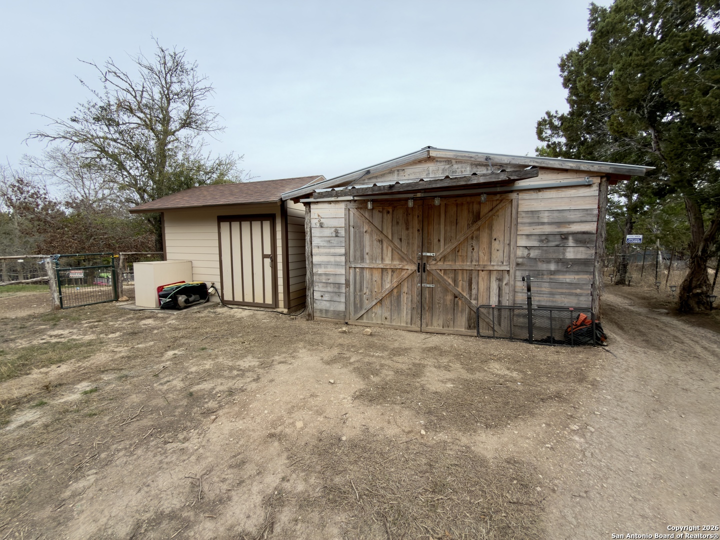 946 Frontier Lane Bandera, TX 78003 - Photo 39 of 48 a view of a house with a yard