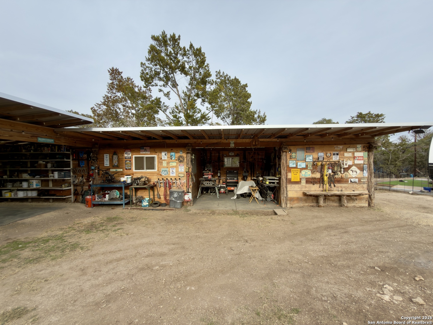 946 Frontier Lane Bandera, TX 78003 - Photo 43 of 49 a view of a chairs and a garage in a room
