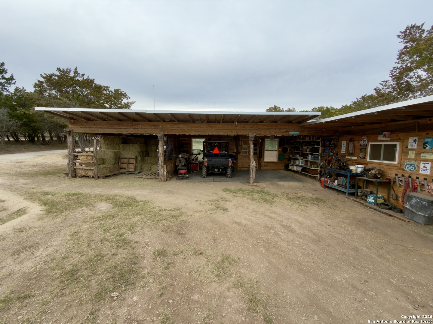 946 Frontier Lane Bandera, TX 78003 - Photo 45 of 49 a view of a car park in front of house