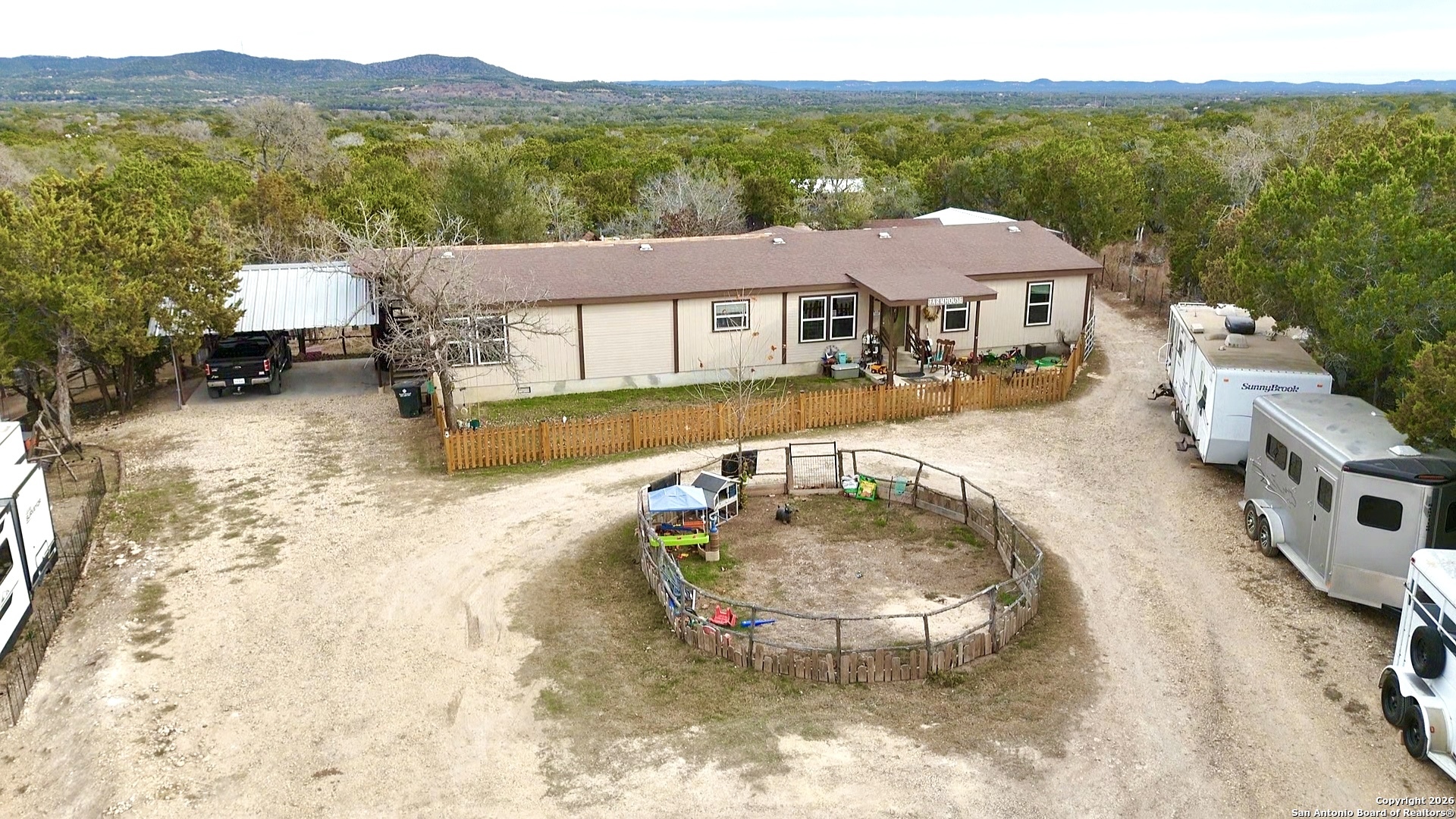 946 Frontier Lane Bandera, TX 78003 - Photo 6 of 49 an aerial view of a house with swimming pool