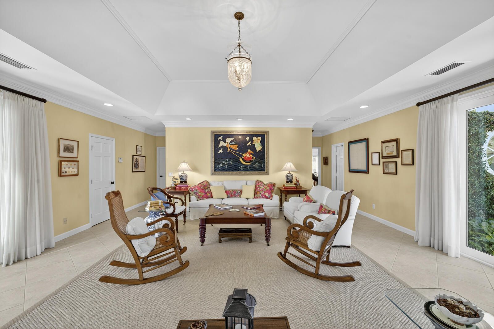 625 Riomar Drive Vero Beach, FL 32963 - Photo 11 of 54 a living room with furniture a window and a flat screen tv