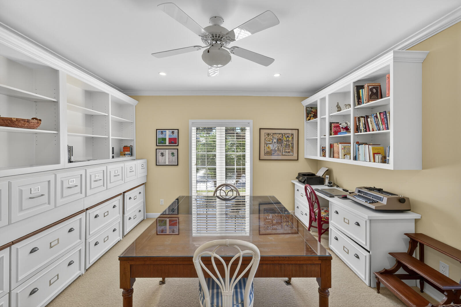 625 Riomar Drive Vero Beach, FL 32963 - Photo 12 of 54 a dining room with furniture a rug windows and a chandelier