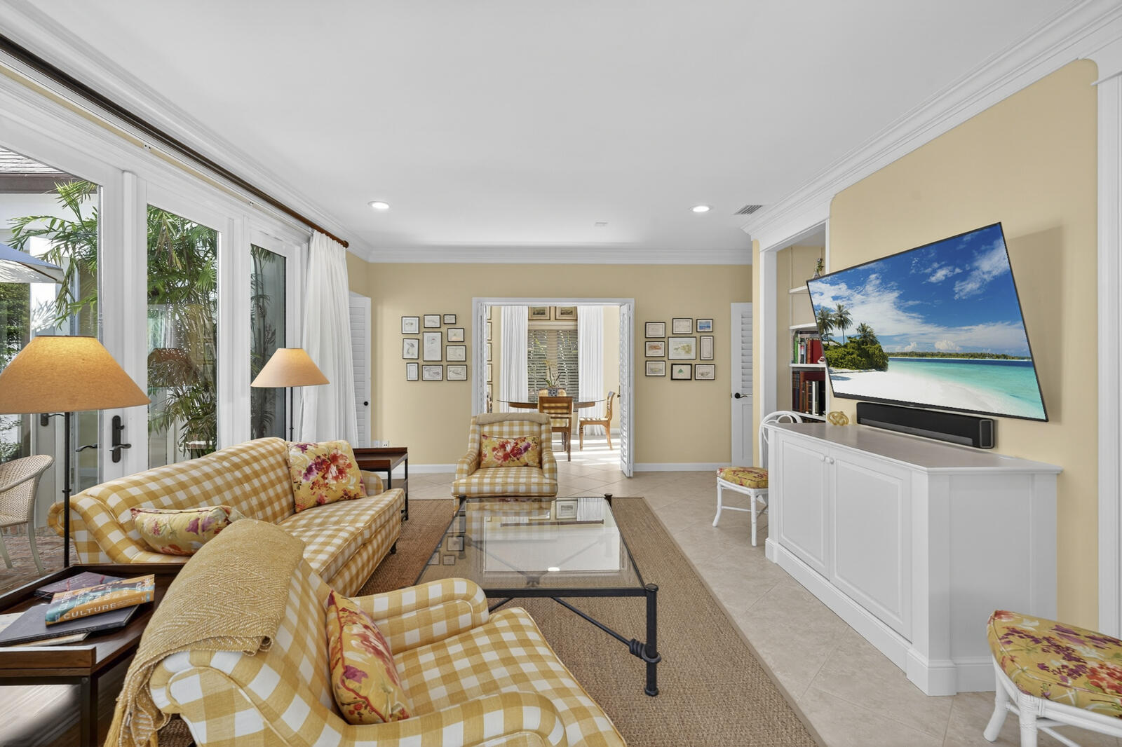 625 Riomar Drive Vero Beach, FL 32963 - Photo 16 of 54 a bedroom with furniture and a flat screen tv