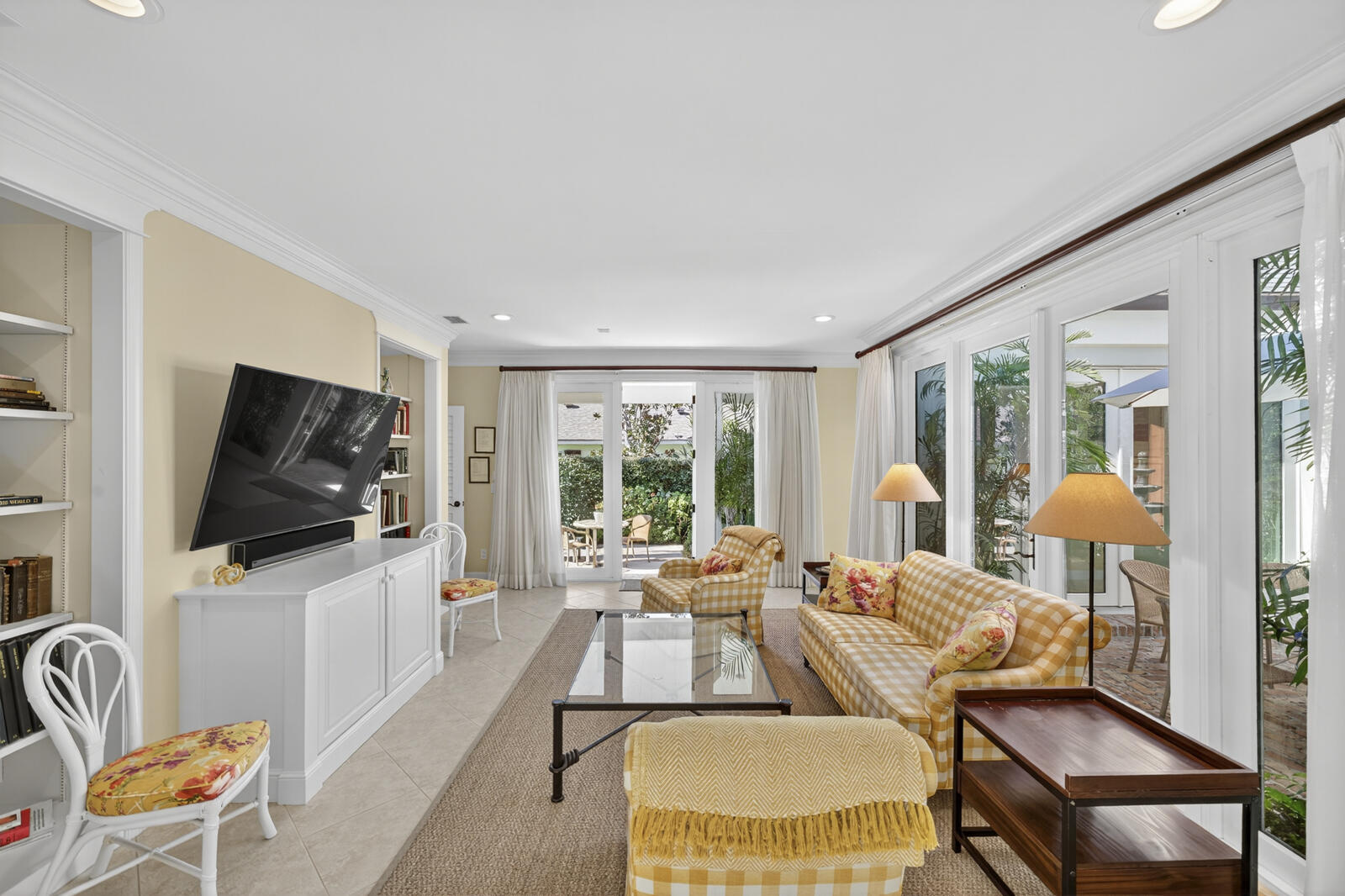 625 Riomar Drive Vero Beach, FL 32963 - Photo 17 of 54 a living room with furniture and a flat screen tv