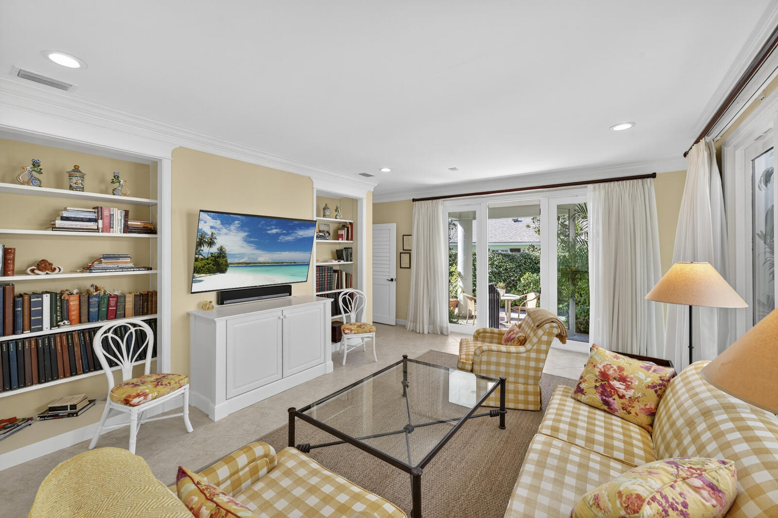 625 Riomar Drive Vero Beach, FL 32963 - Photo 18 of 54 a living room with furniture and a flat screen tv