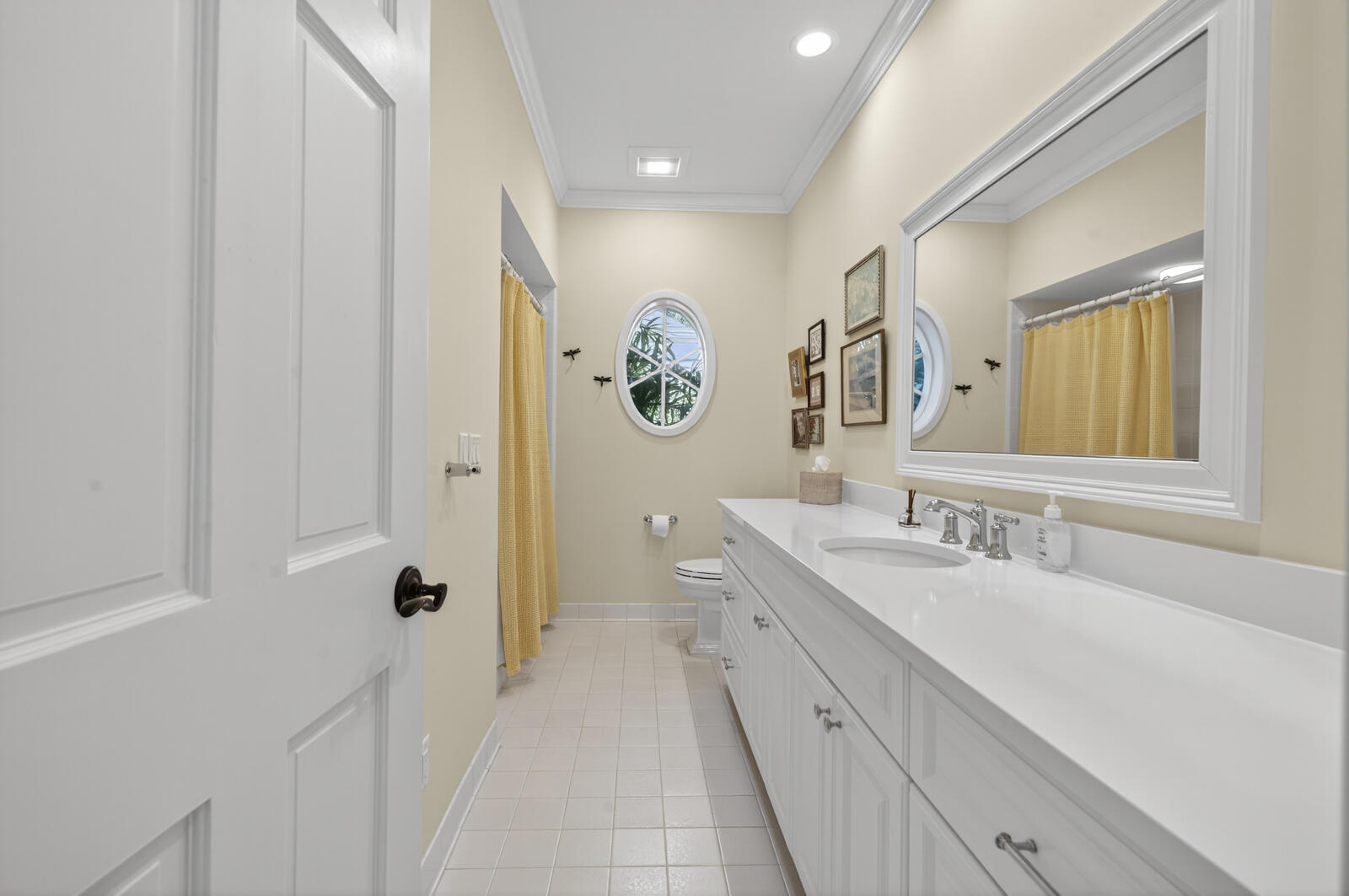 625 Riomar Drive Vero Beach, FL 32963 - Photo 45 of 54 a spacious bathroom with a double vanity sink toilet mirror and shower