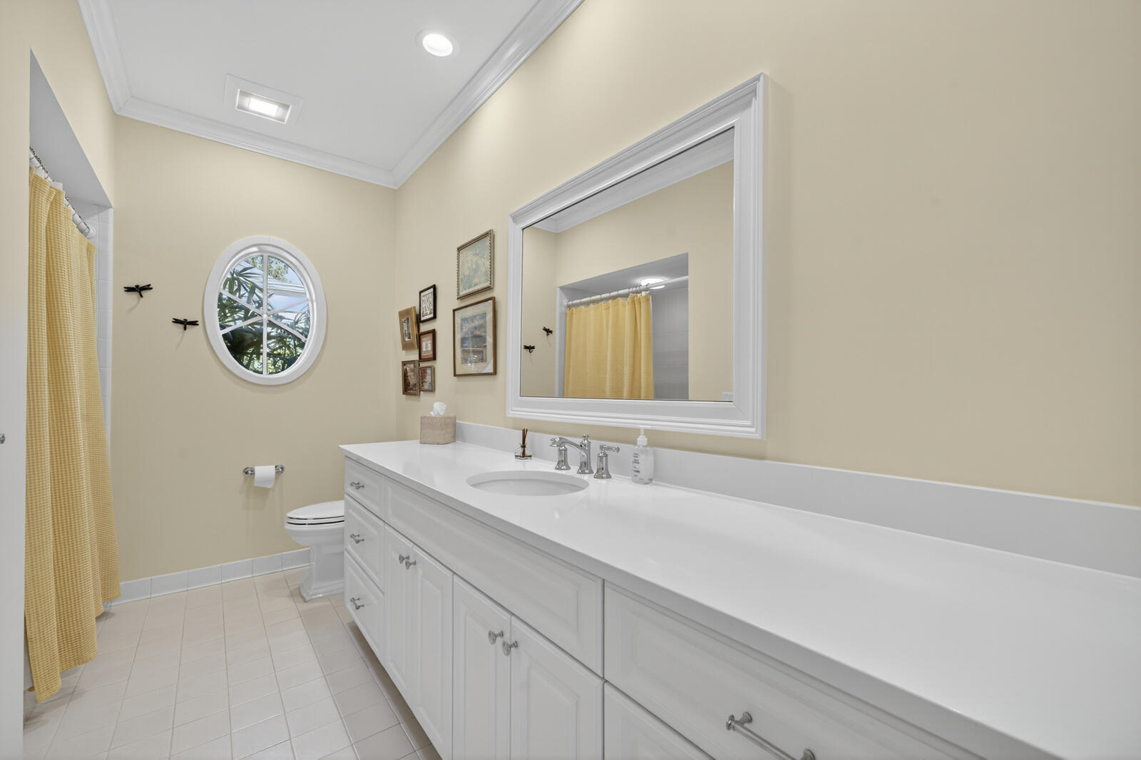 625 Riomar Drive Vero Beach, FL 32963 - Photo 47 of 54 a spacious bathroom with a double vanity sink and a mirror