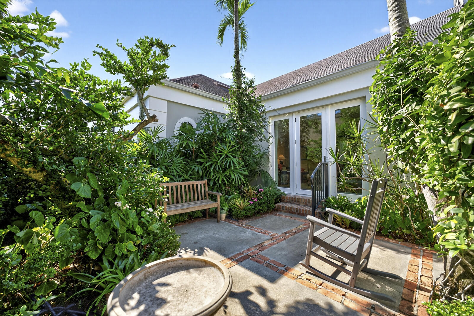 625 Riomar Drive Vero Beach, FL 32963 - Photo 49 of 54 a front view of a house with a garden