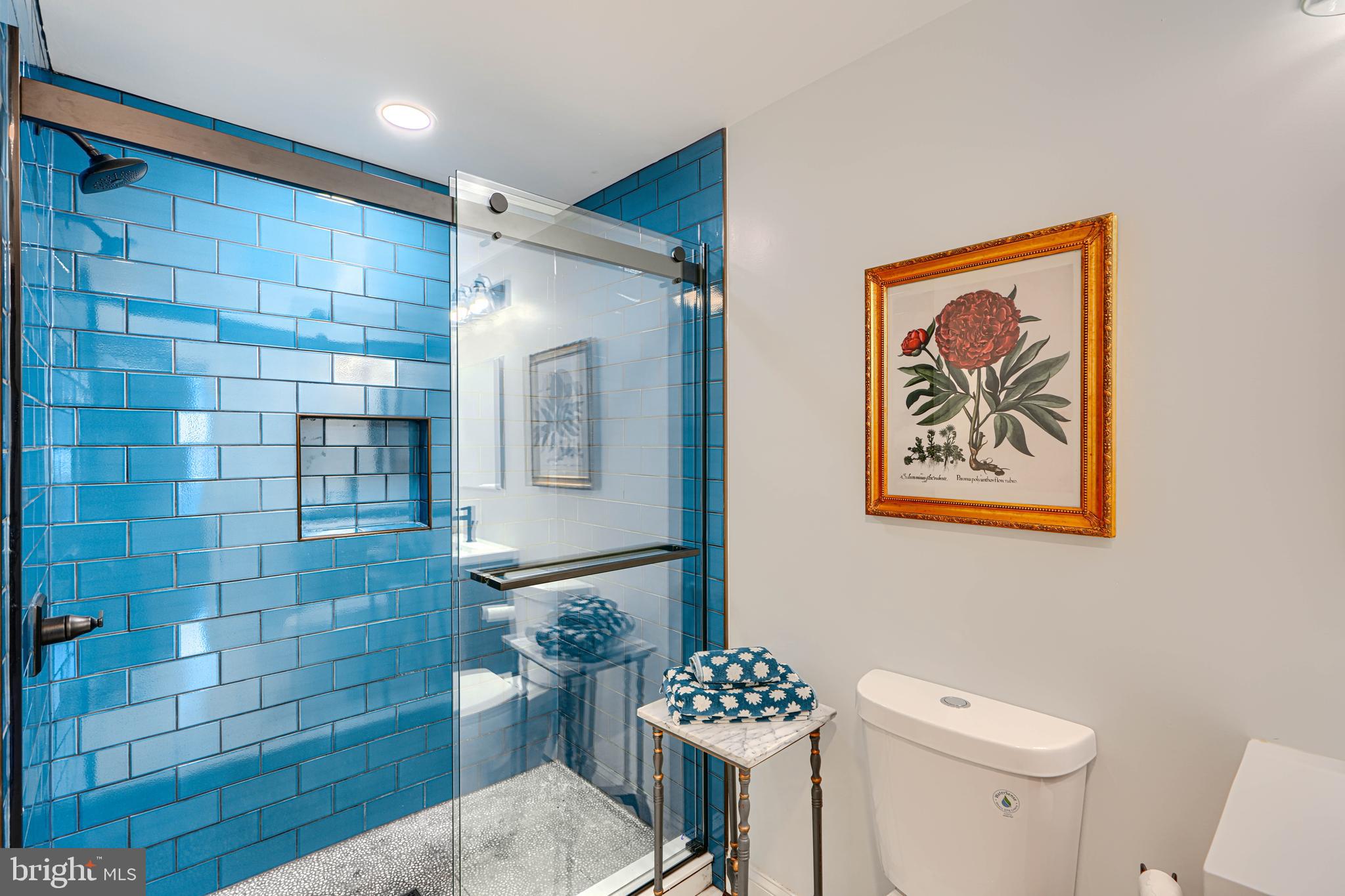 5000 Greenleaf Road Baltimore, MD 21210 - Photo 22 of 45 a bathroom with a toilet a sink and shower