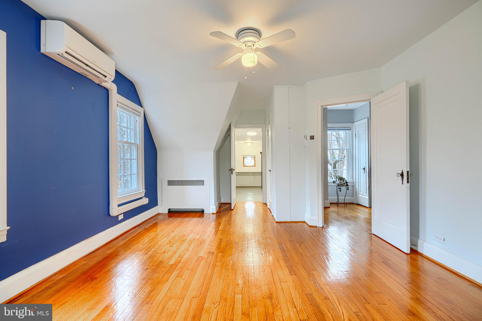 5000 Greenleaf Road Baltimore, MD 21210 - Photo 34 of 45 a view of an empty room with wooden floor and a window