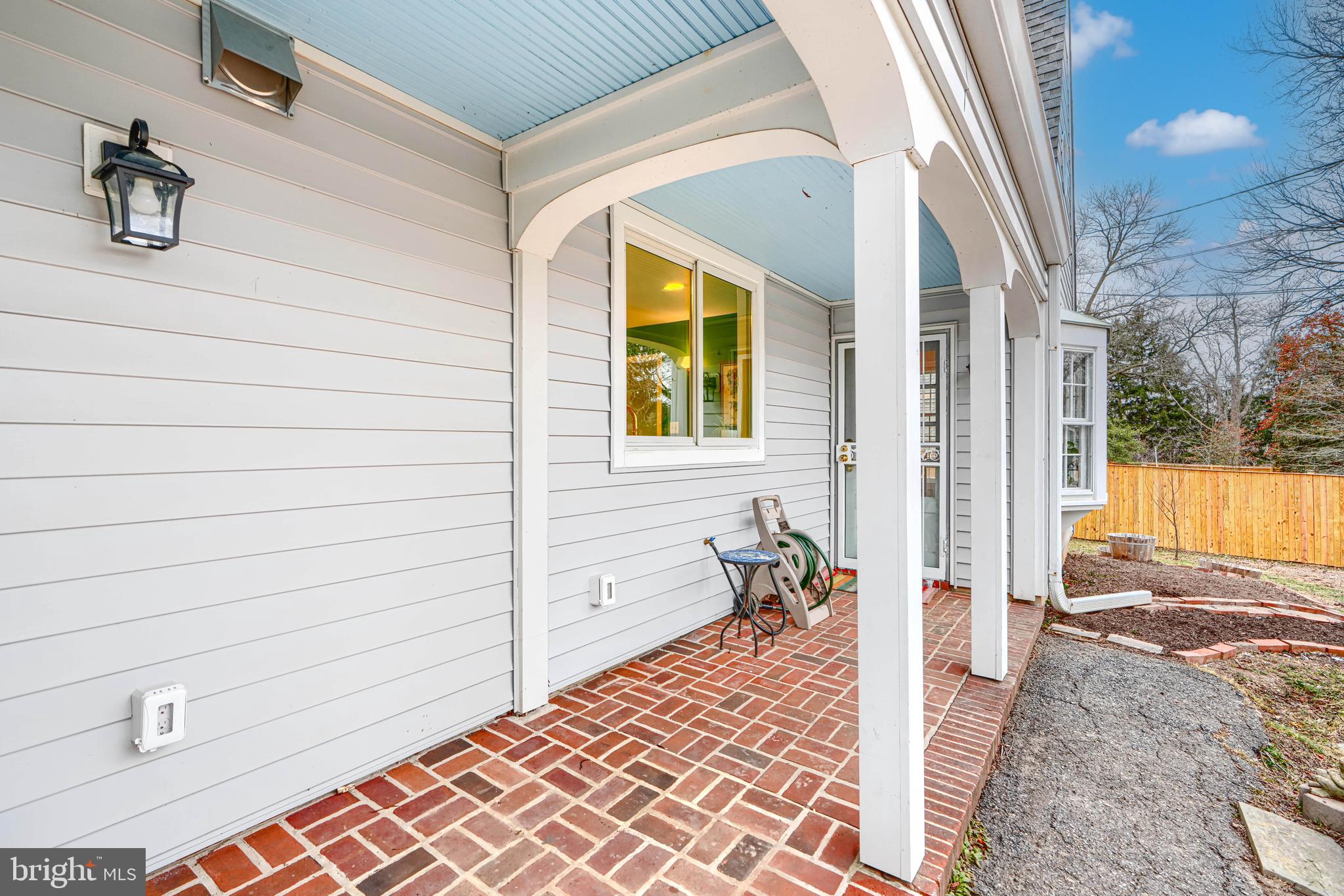 5000 Greenleaf Road Baltimore, MD 21210 - Photo 40 of 45 a view of a porch with a table and chairs