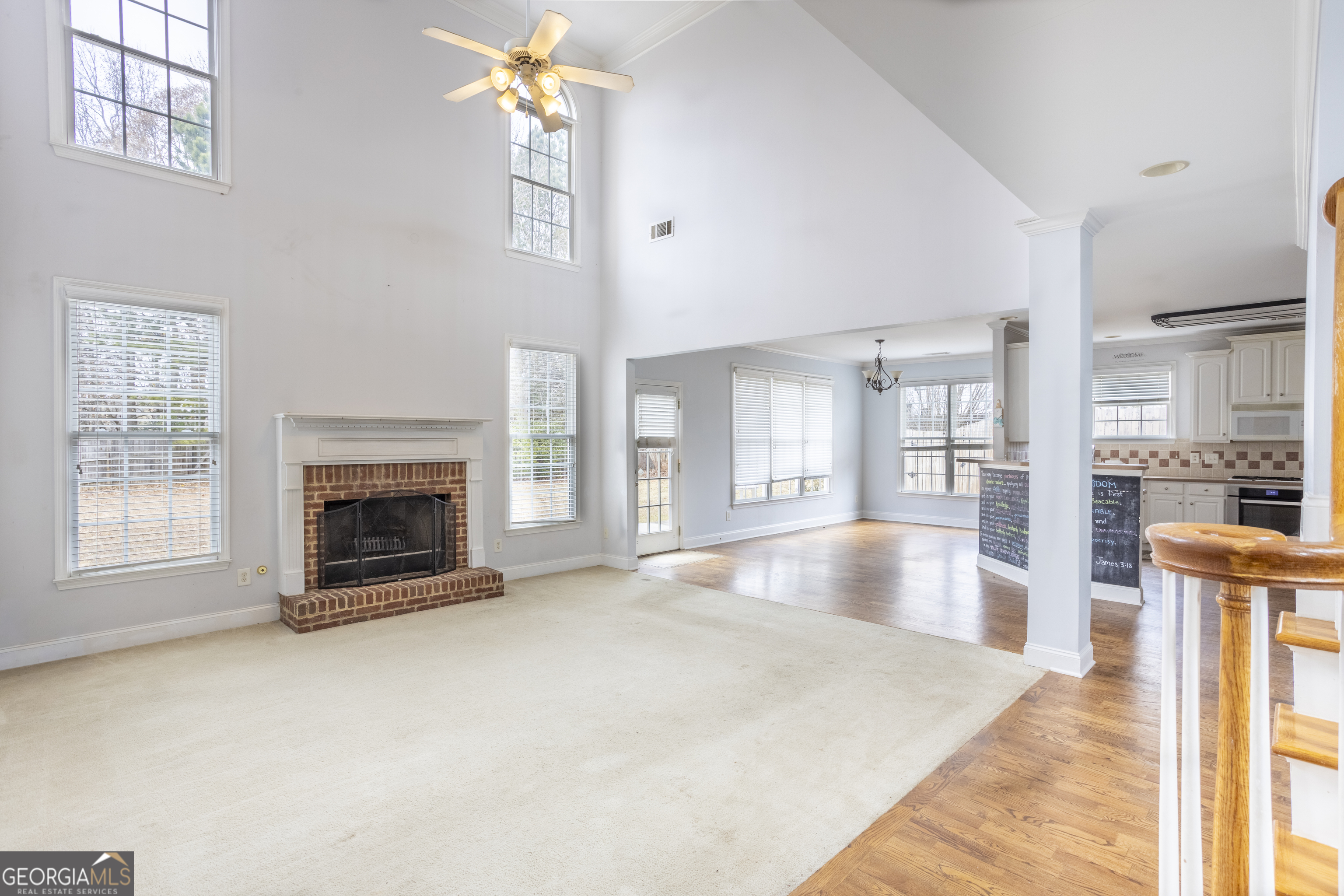 1031 Jordan Road Dacula, GA 30019 - Photo 2 of 35 a view of an empty room with fireplace and a window