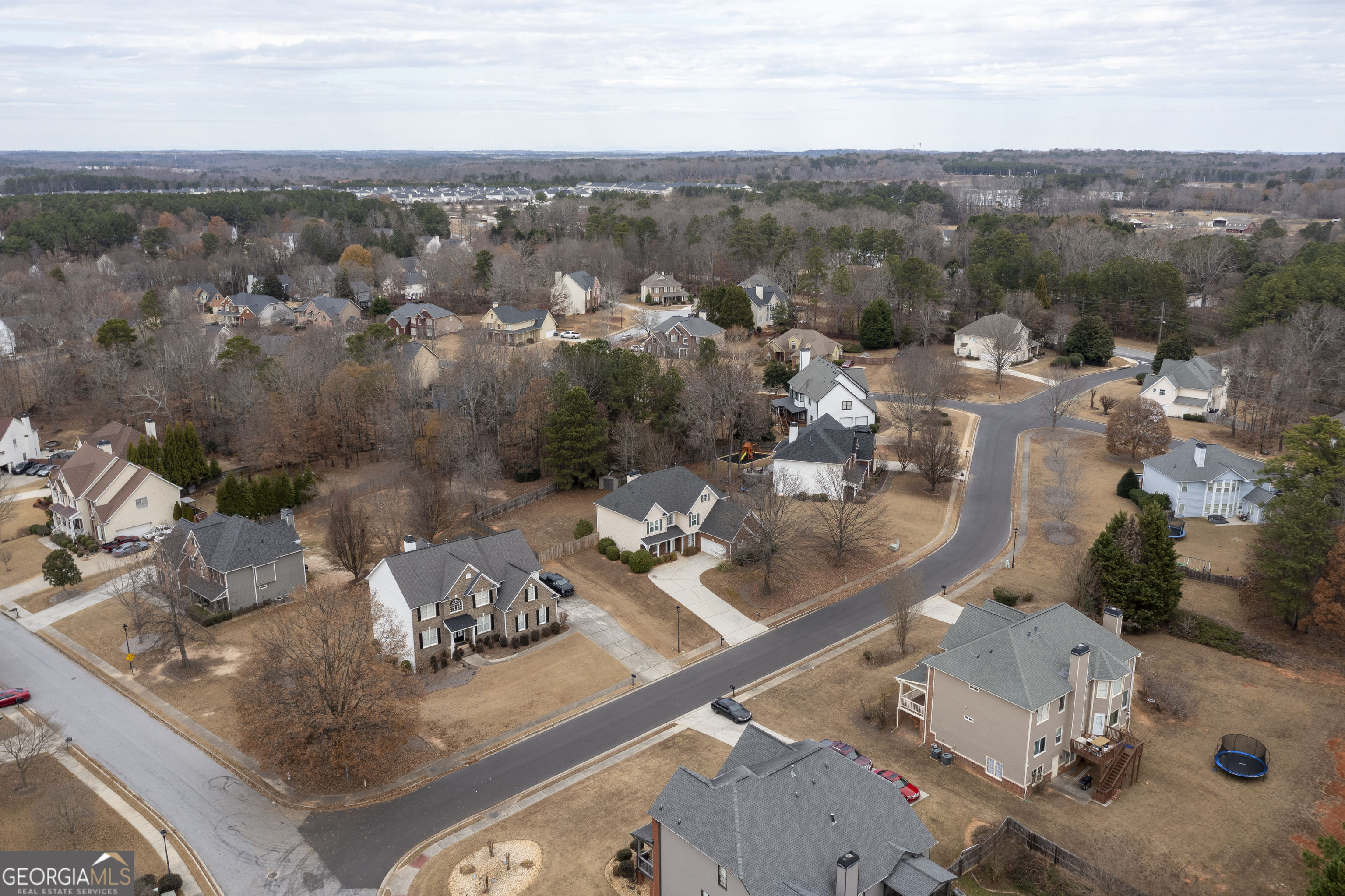 1031 Jordan Road Dacula, GA 30019 - Photo 32 of 35 an aerial view of a house with outdoor seating
