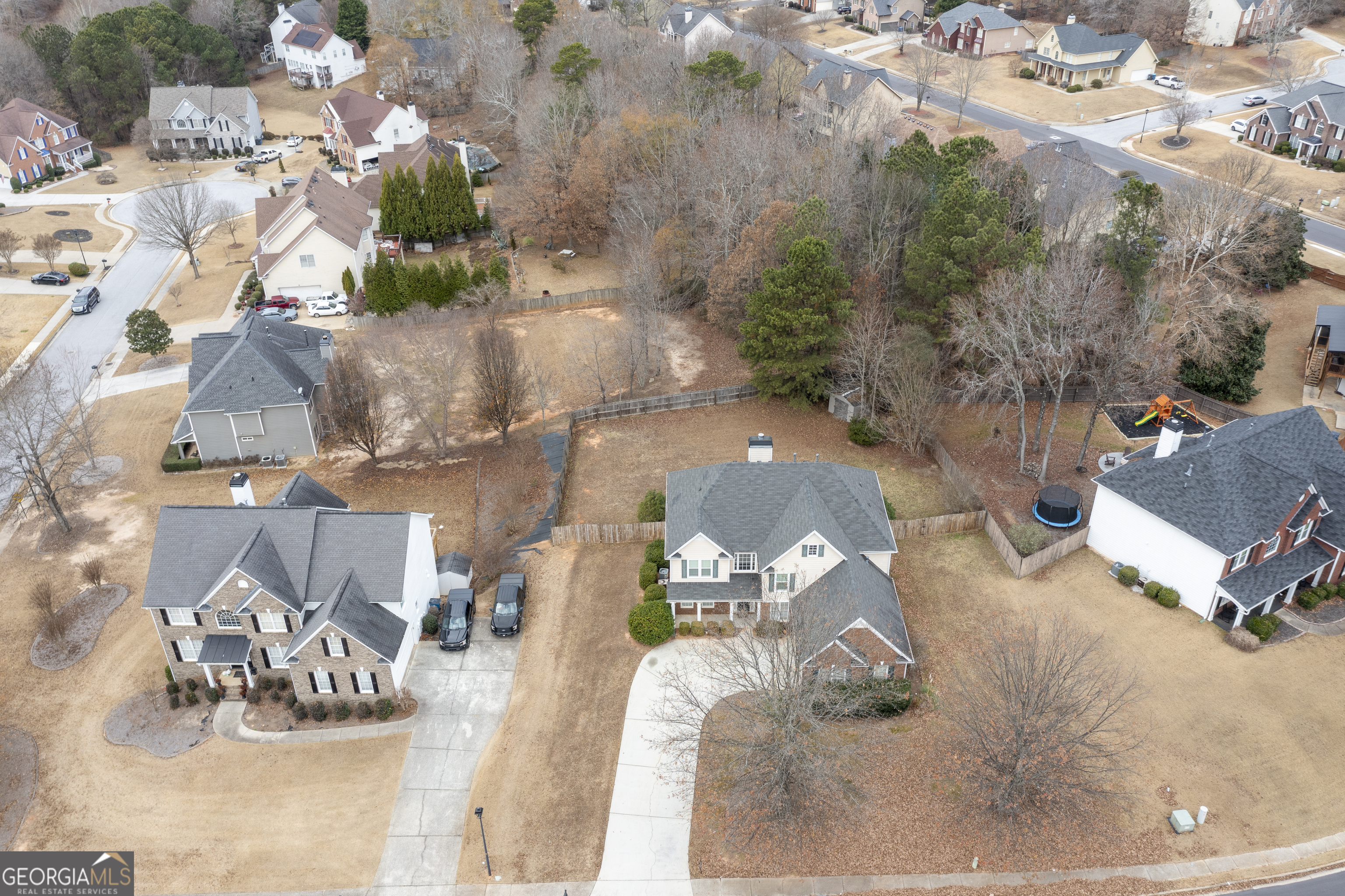 1031 Jordan Road Dacula, GA 30019 - Photo 33 of 35 an aerial view of a house with a yard