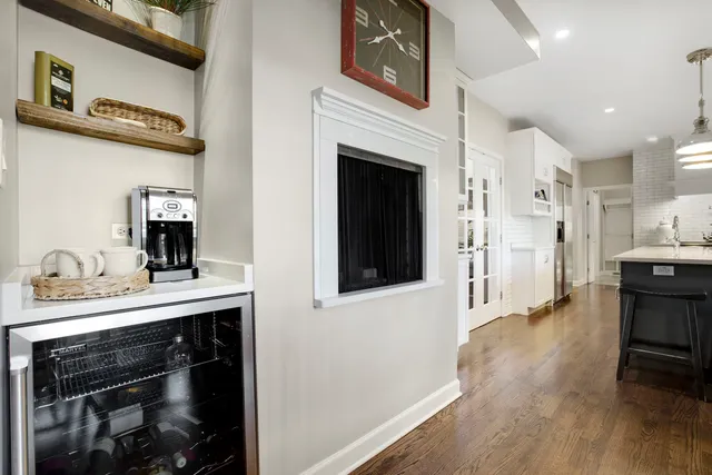a view of a kitchen cabinets and a stove