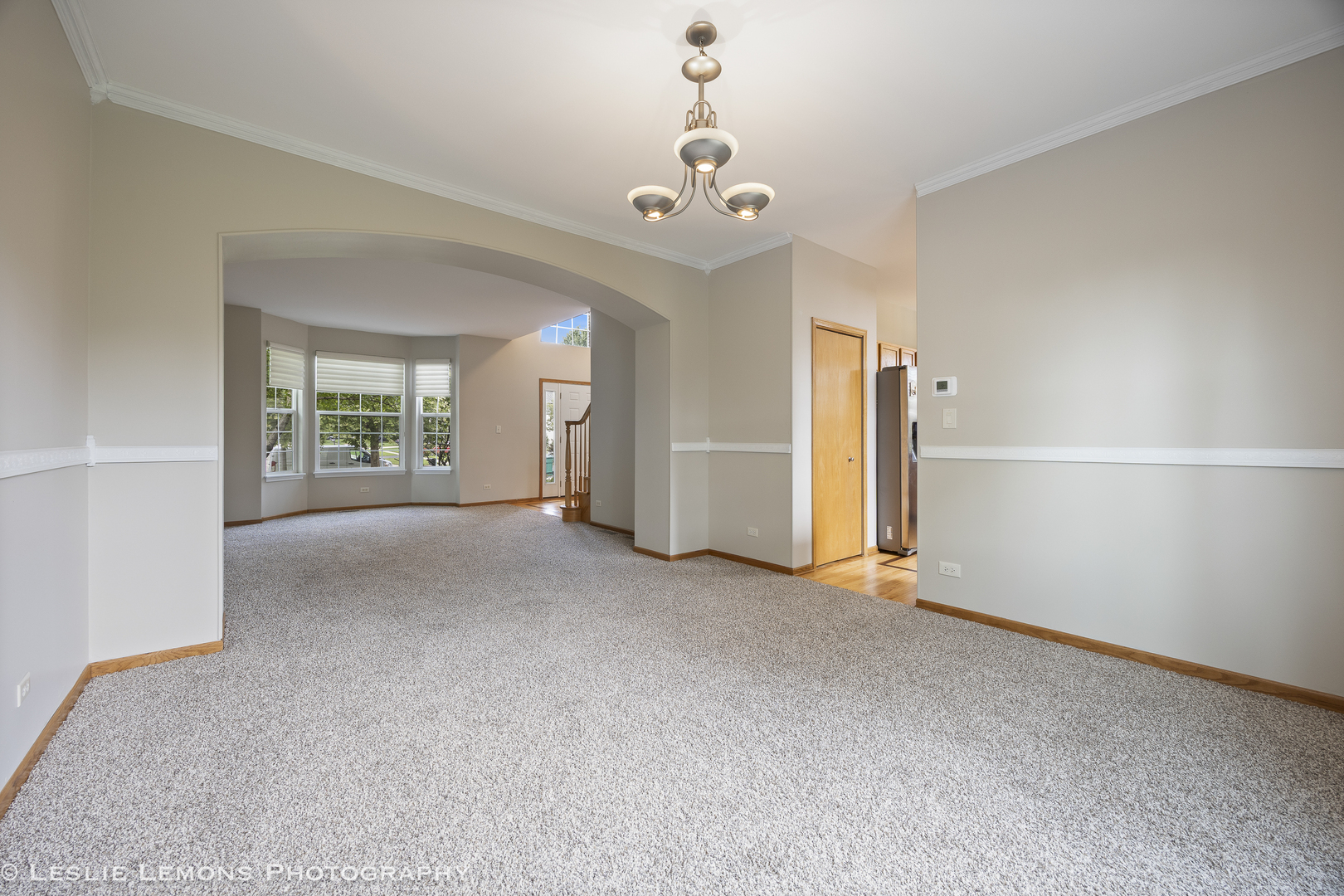 13141 Cinnamon Circle Plainfield, IL 60585 - Photo 10 of 35 a view of livingroom with hardwood floor and ceiling fan