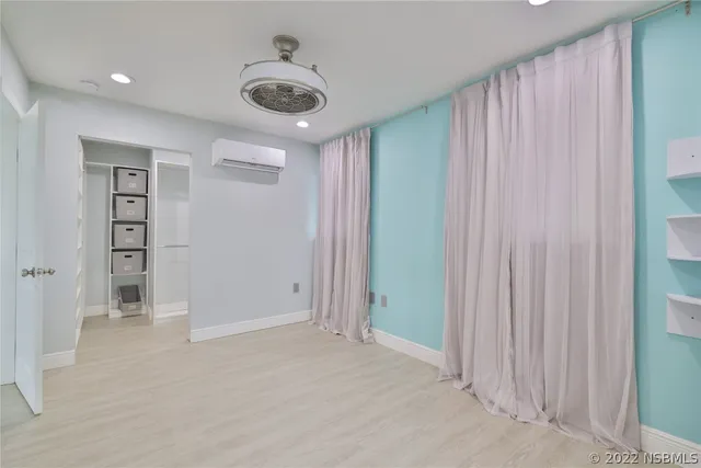 a bathroom with a granite countertop sink a mirror and a