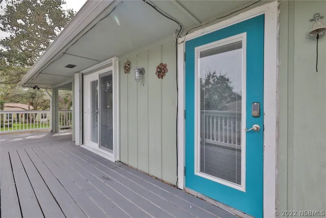a view of a backyard with trees