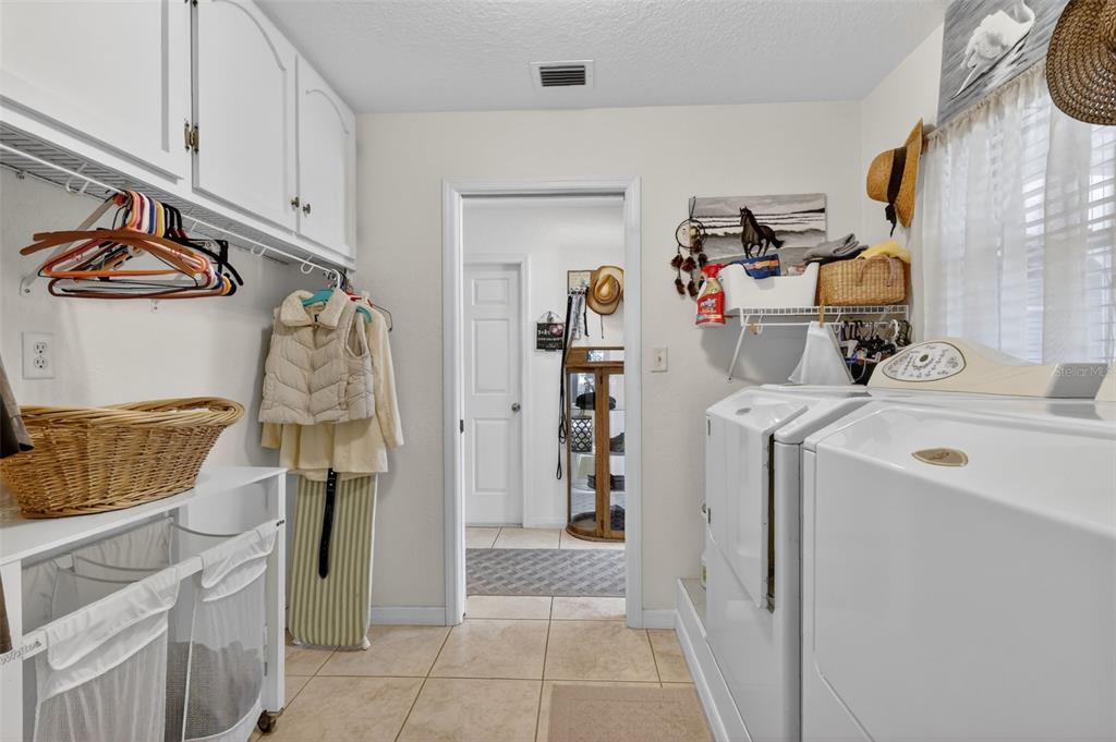 19703 Twin Ponds Road Umatilla, FL 32784 - Photo 36 of 62 a room with storage and utility