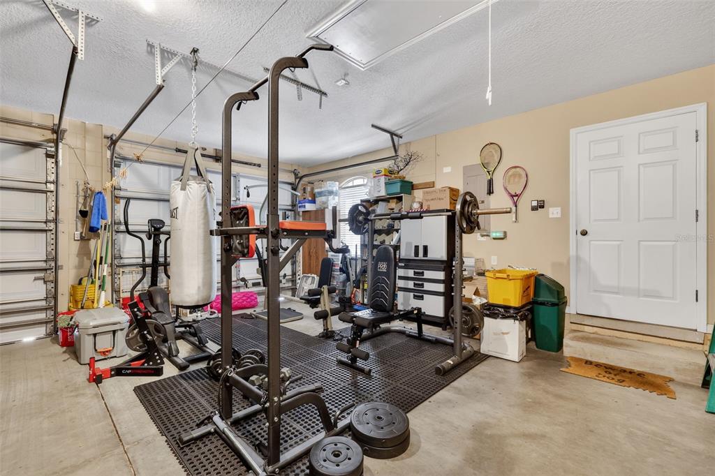 19703 Twin Ponds Road Umatilla, FL 32784 - Photo 39 of 62 a view of a room with gym equipment
