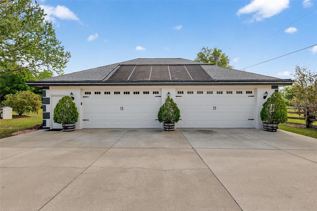 19703 Twin Ponds Road Umatilla, FL 32784 - Photo 49 of 62 a view of entrance gate of the house