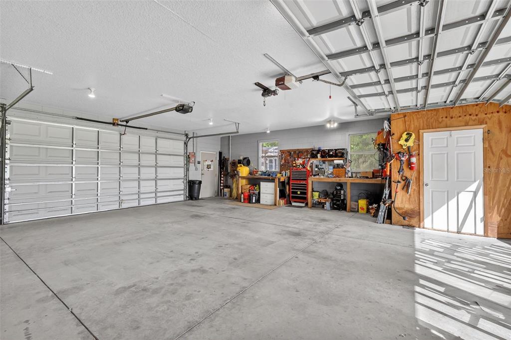 19703 Twin Ponds Road Umatilla, FL 32784 - Photo 51 of 62 a view of a garage with storage