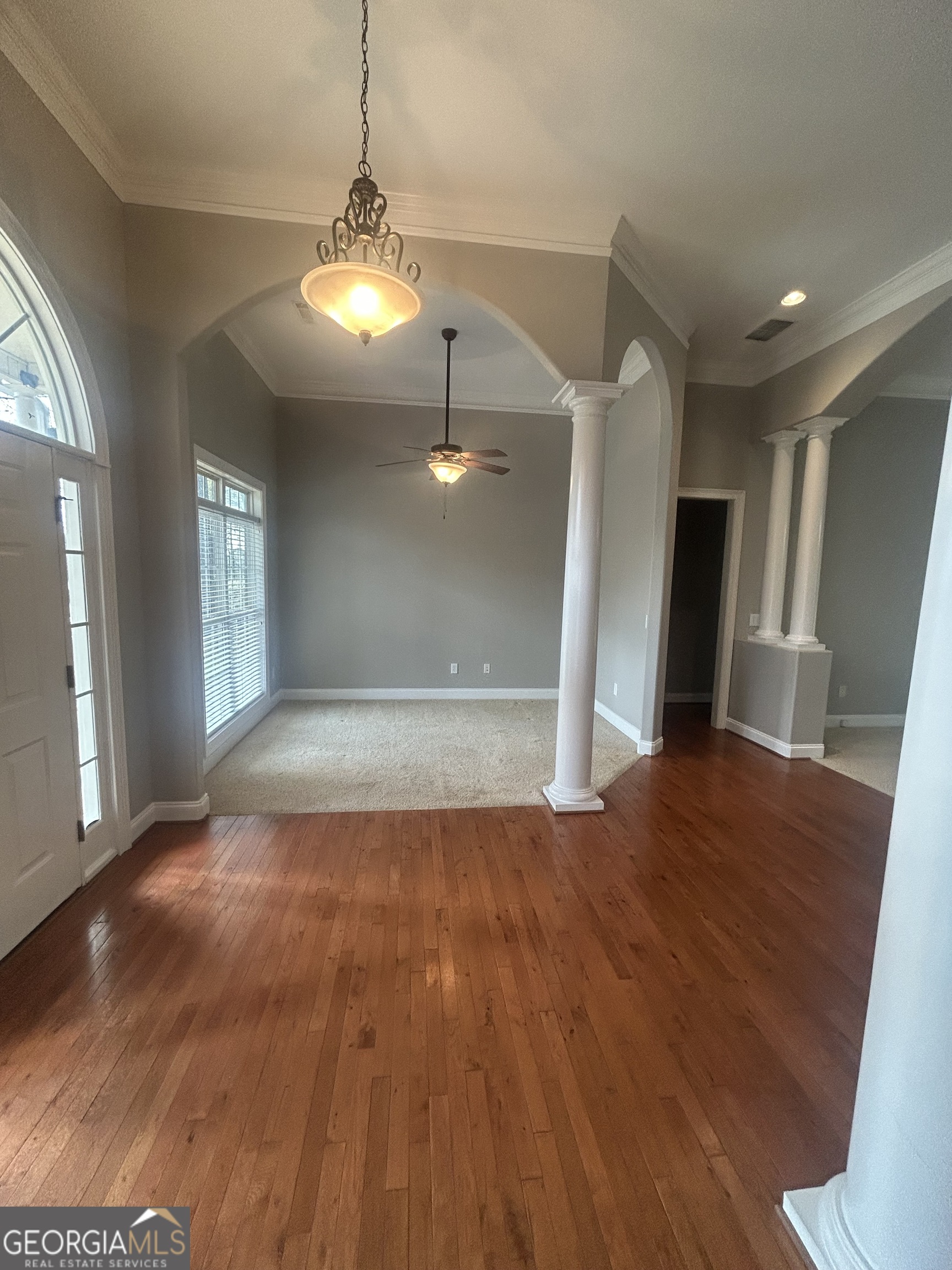 160 Walnut Ridge Way Covington, GA 30014 - Photo 11 of 36 a view of a livingroom with a ceiling fan and window