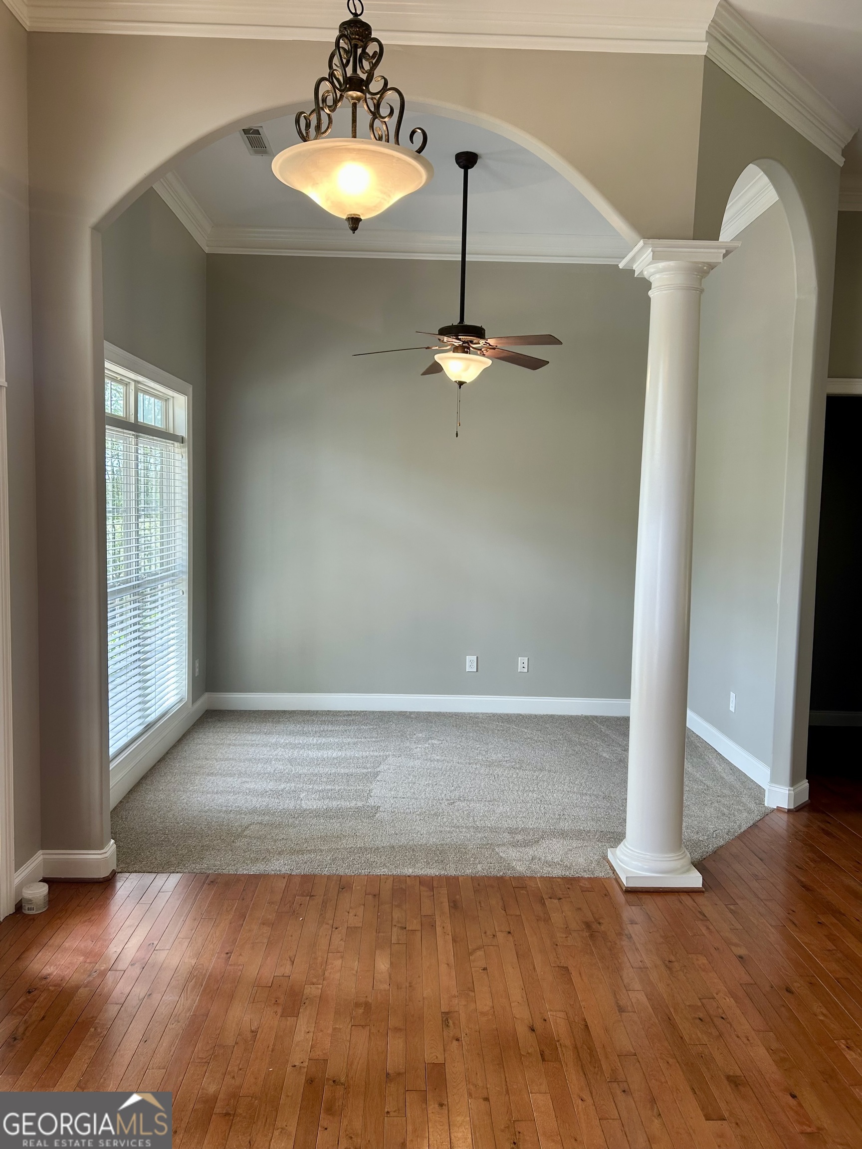 160 Walnut Ridge Way Covington, GA 30014 - Photo 12 of 36 a view of a livingroom with a window and wooden floor