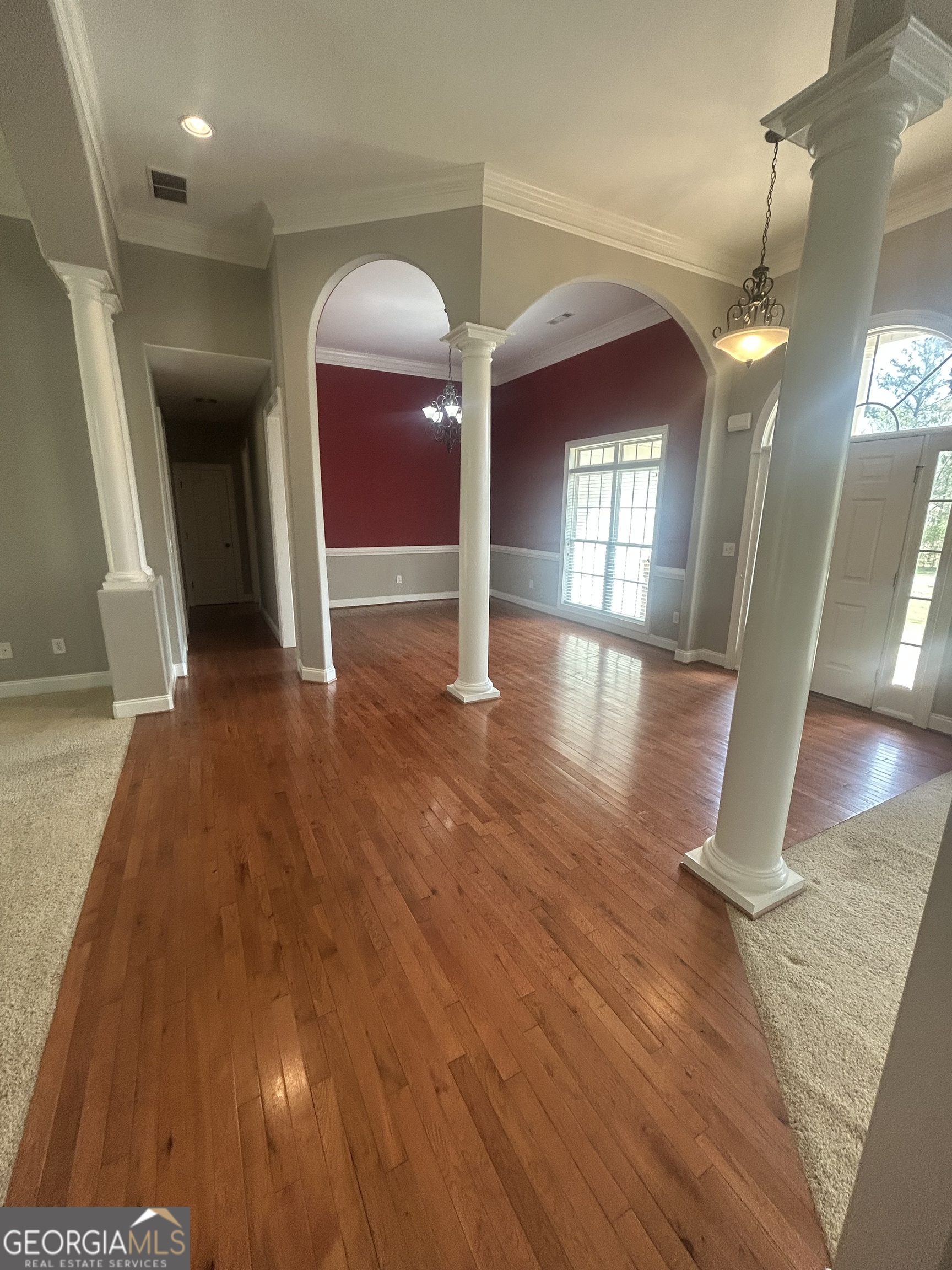 160 Walnut Ridge Way Covington, GA 30014 - Photo 13 of 36 a view of a hallway with wooden floor