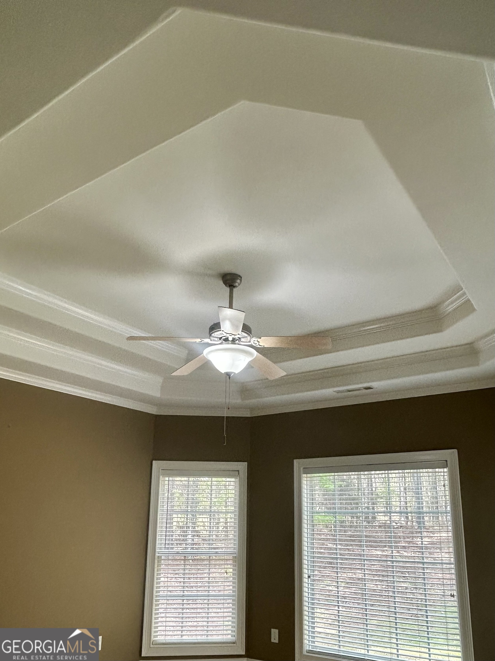 160 Walnut Ridge Way Covington, GA 30014 - Photo 24 of 36 a view of a livingroom with a ceiling fan and window