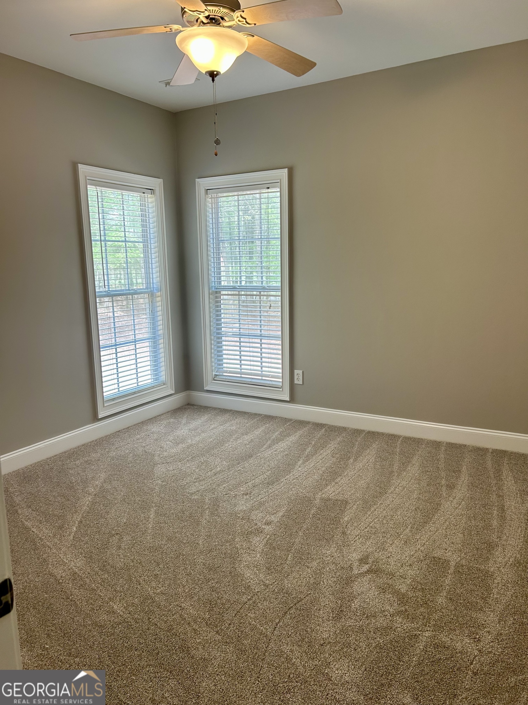 160 Walnut Ridge Way Covington, GA 30014 - Photo 31 of 36 a view of an empty room with a window