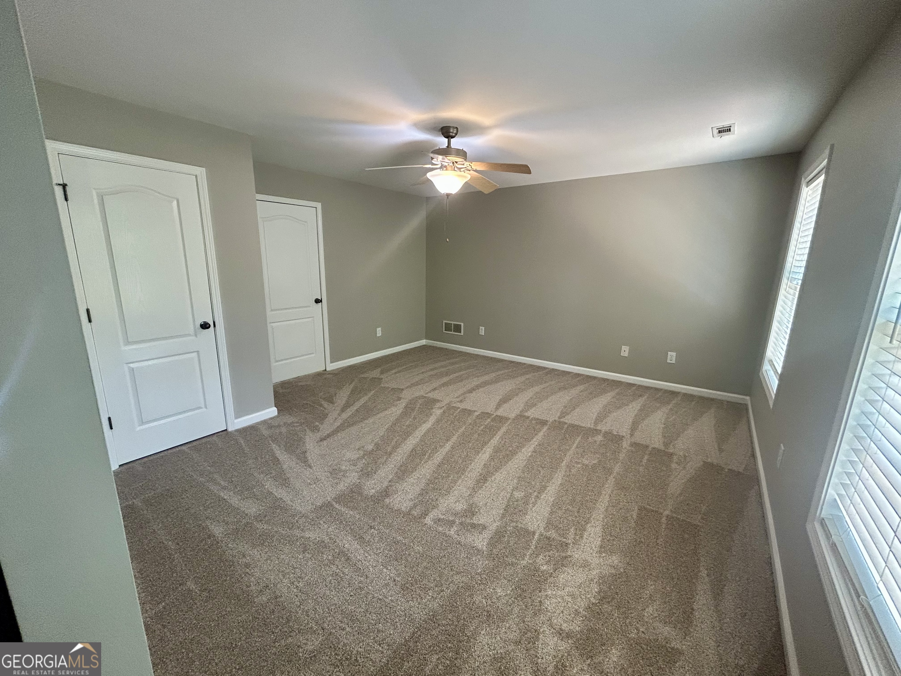 160 Walnut Ridge Way Covington, GA 30014 - Photo 32 of 36 wooden floor in an empty room with a window