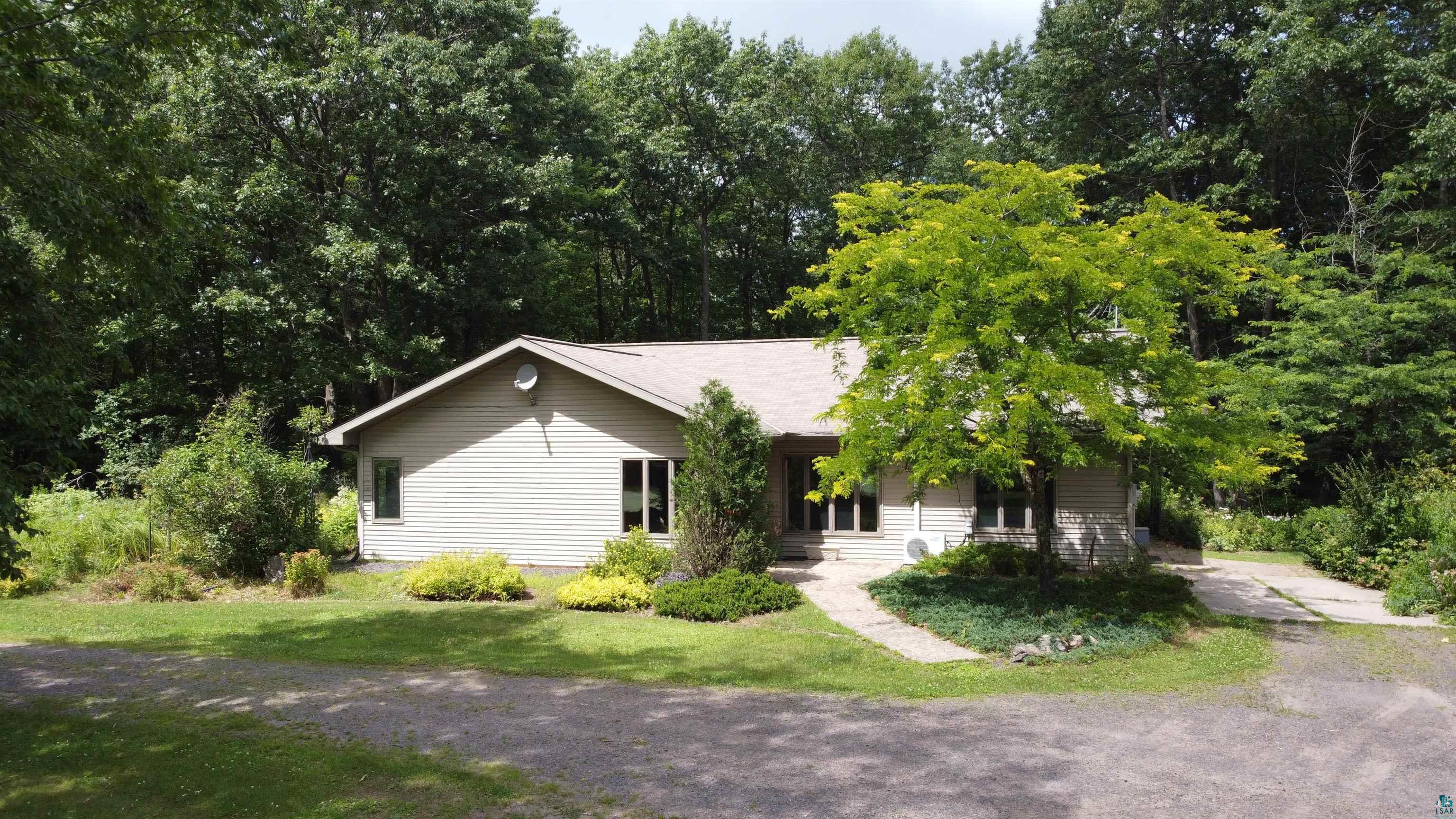 6718 East County Rd B South Range, WI 54874 - Photo 1 of 50 View of front of property with a front lawn