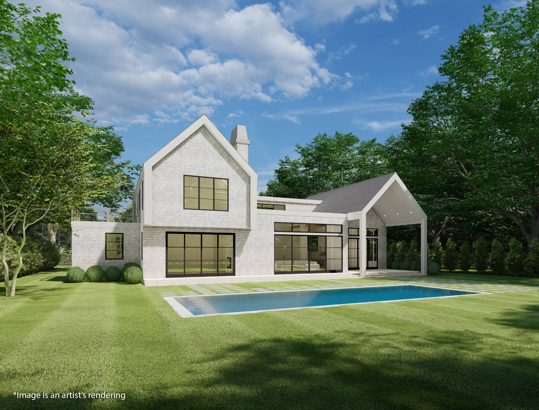 14 Rutland Road East Hampton, NY 11937 - Photo 4 of 12 a front view of a house with a garden